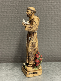 Heiligenbeeld  Franciscus van Assisi met duiven en Tau kruis, resin, 11cm. (10)