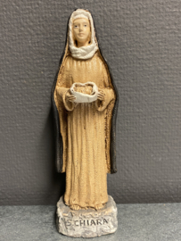 Heiligenbeeld  Clara van Assisi met brood.