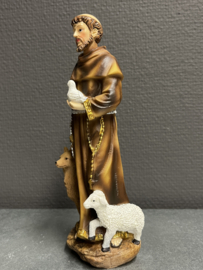 Heiligenbeeld Franciscus van Assisi met wolf, schaap en vogel