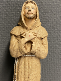 Heiligenbeeld  Franciscus van Assisi, in pij, resin, 21.5cm. (10)