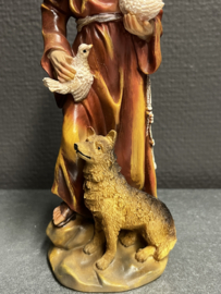 Heiligenbeeld Franciscus van Assisi met wolf en vogel