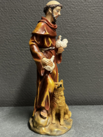 Heiligenbeeld Franciscus van Assisi met wolf en vogel