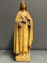 Heilige Clara beelden en plaquettes