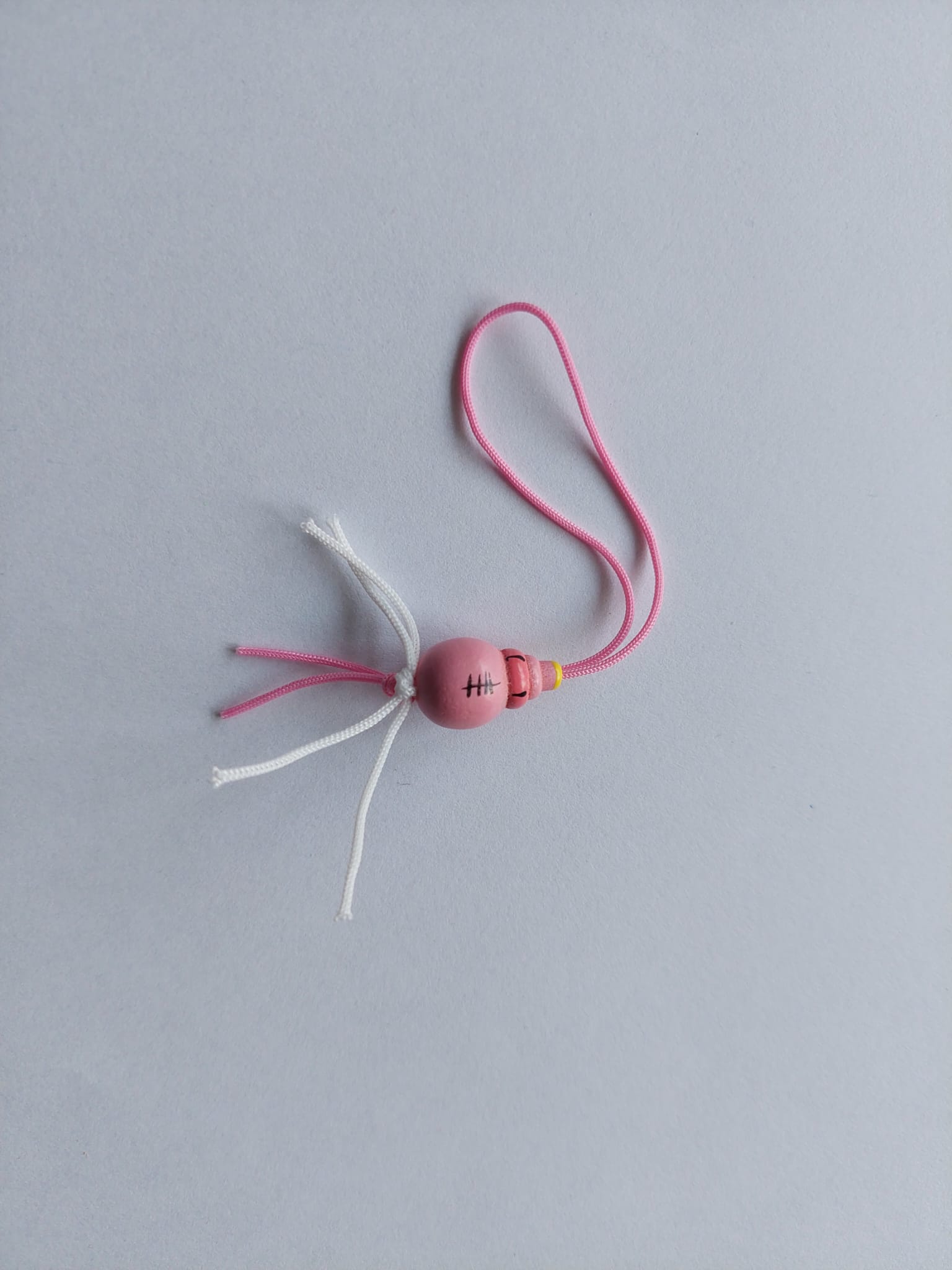 Gelukspoppetje babyfles roze