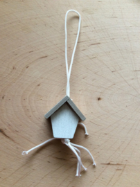 Gelukspoppetje huis