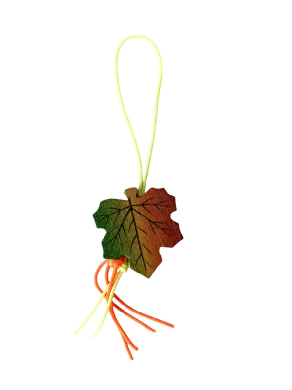 Gelukspoppetje herfstblad