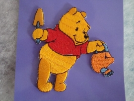 Luierzak ruit oranje met applicatie Winnie the Pooh
