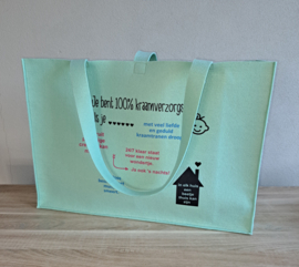 Vilten tas voor babyweegschaal met tekst wit/lichtroze/lichtblauw