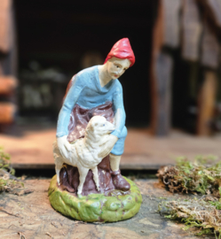Gips 34:  Oud beeld / Herder knielend met kind