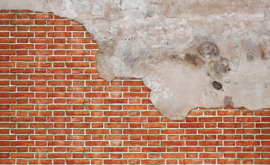 Fotobehang Stenen muur met beton