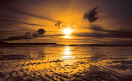 Fotobehang Zonsondergang bij het Strand