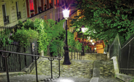 Fotobehang Straat in Parijs bij avond