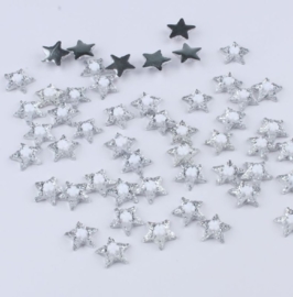 Flatback glitter ster met wit bloemetje 1.2cm.