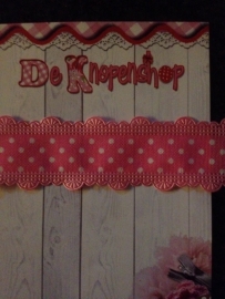 Stippenband met schulp randje roze