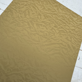 Leer kreuk motief parelmoer glinster goud geel.