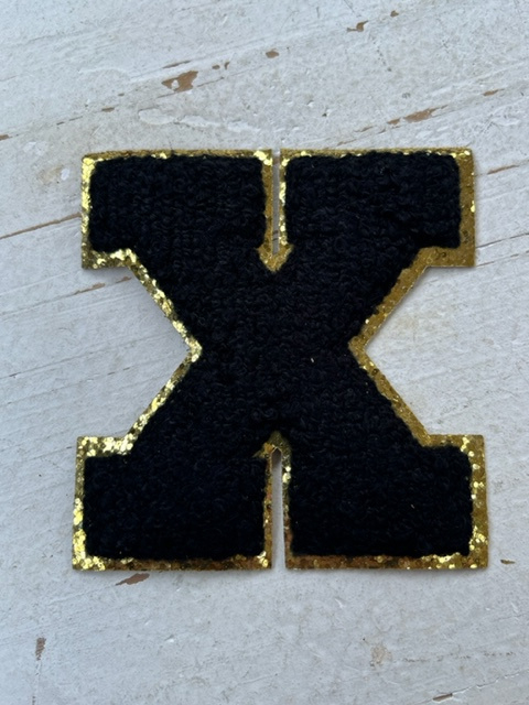 Opstrijkbare applicatie letter X  zwart-goud glitter