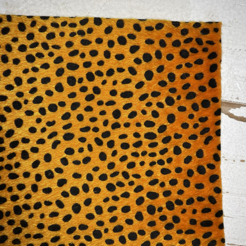 Vacht leer panter patroon luipaard geel/oranje.