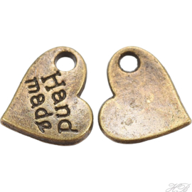 04948 Bedel Hart hand made Antiek brons (Nikkelvrij) 9x9x1mm; gat 1mm ±15 stuks