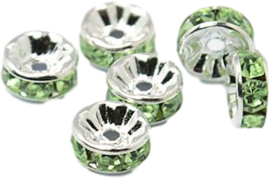 04399 Spacer rondel Rhinestone Zilverkleurig (Nikkel vrij)/peridot 7 stuks