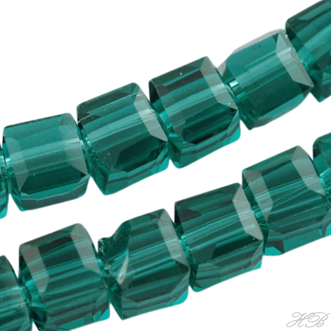 05394 Glaskraal vierkant facet Teal   5~6mm; gat 1mm ±25 stuks