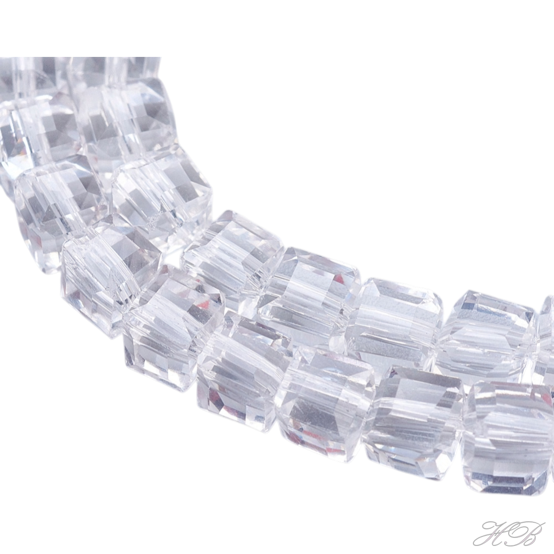 05405 Glaskraal vierkant facet Transparant   4~5mm; gat 1mm ±30 stuks
