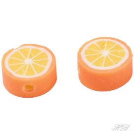 00677 Fimokraal Sinaasappel schijfje Oranje 10x4,5mm; gat 1,8mm ±12 stuks
