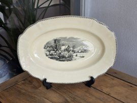 Landschap zwart Societe Ceramique grote ovale schaal 40 cm (ingelijmde chip)