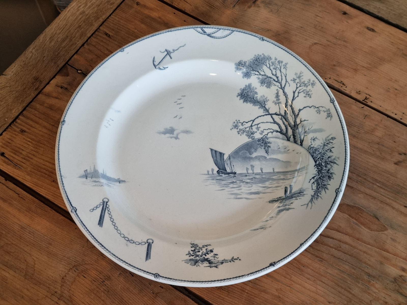 Verkocht = Petrus Regout Marines donkerblauw serveerbord 34 cm (rond model, zonsondergang)