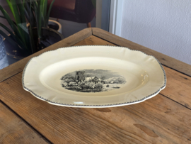 Landschap zwart Societe Ceramique grote ovale schaal 40 cm (ingelijmde chip)