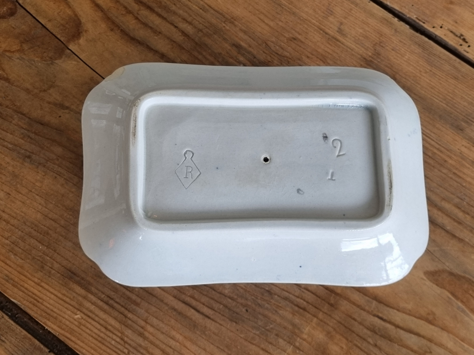 Zwiebelmuster Regout sauskom op onderschotel