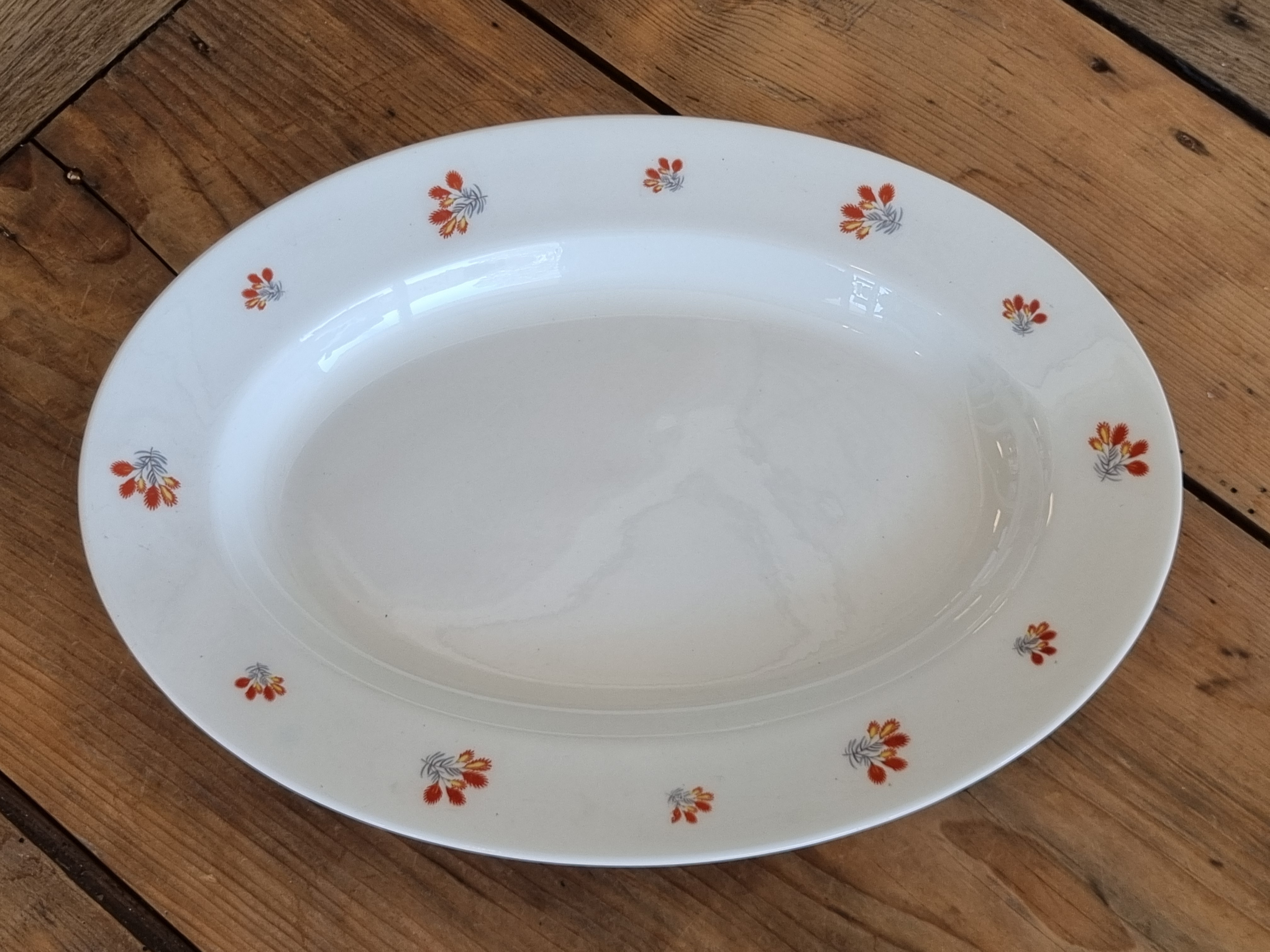 Regout creme decor rode pluim ovale schaal 34 cm
