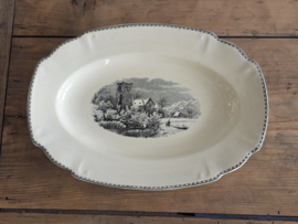 Landschap zwart Societe Ceramique grote ovale schaal 40 cm (ingelijmde chip)