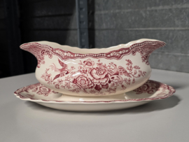 Engels rood Crown Ducal Bristol sauskom op vaste onderschotel