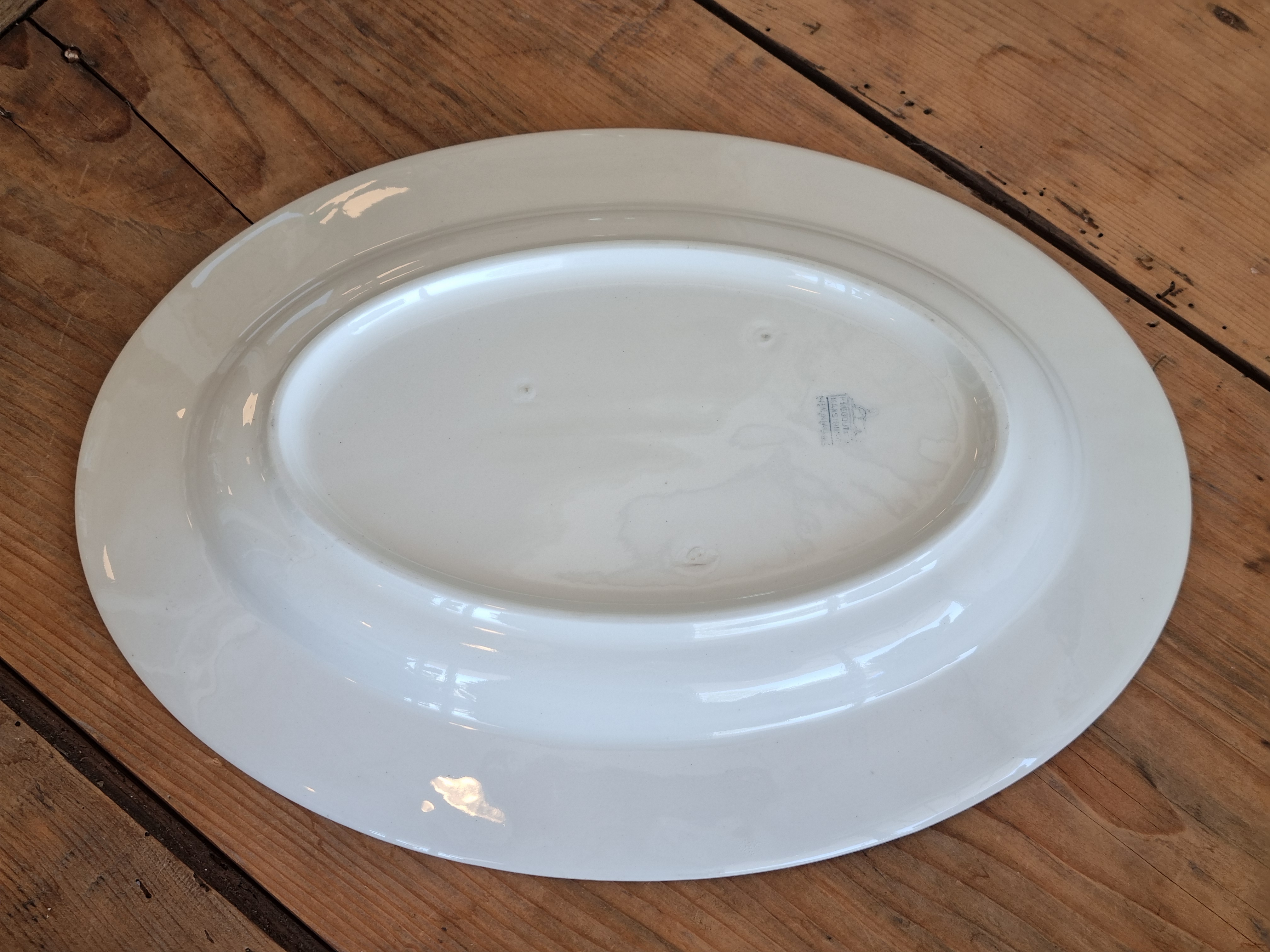 Regout creme decor rode pluim ovale schaal 34 cm