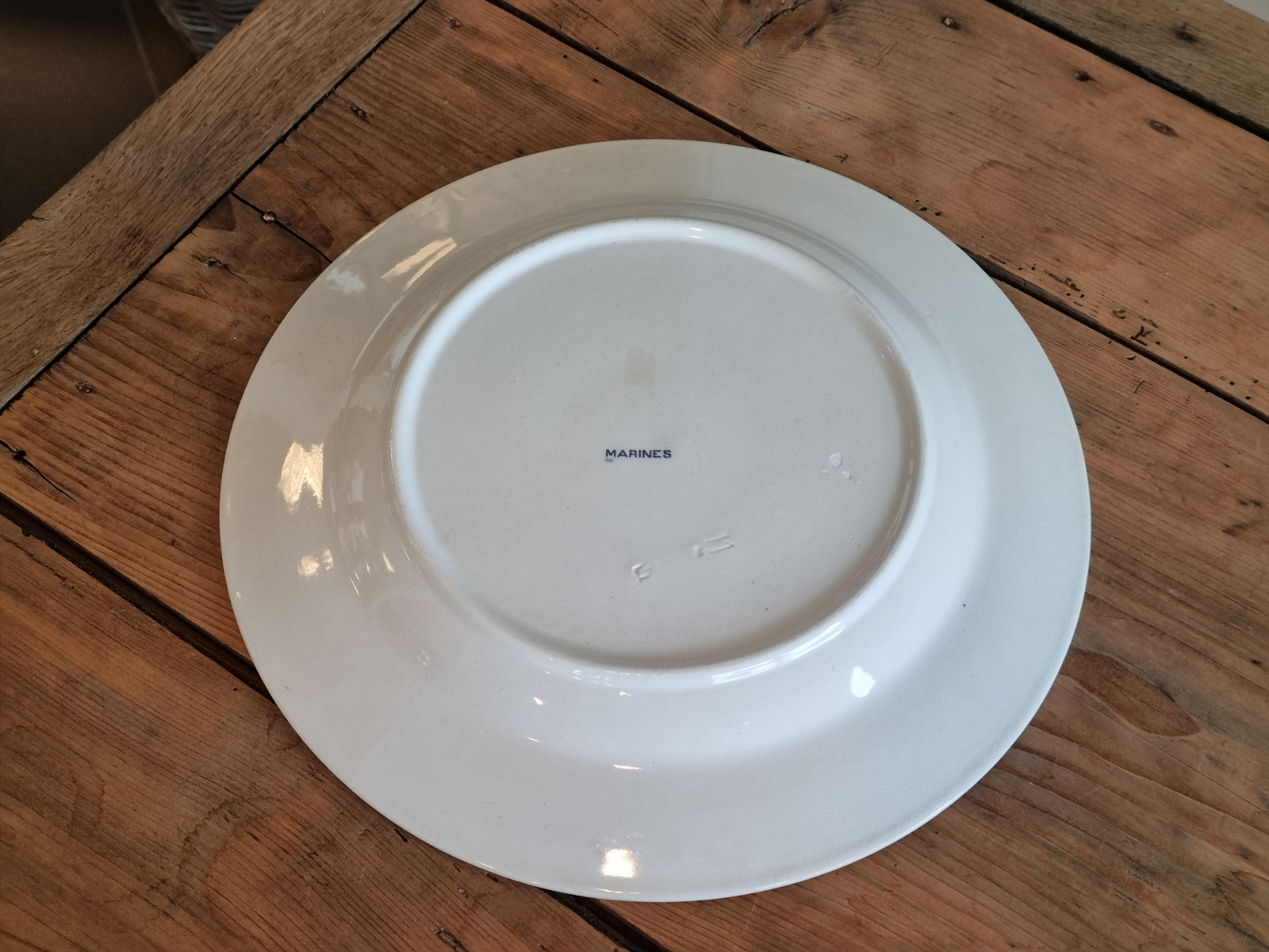 Verkocht = Petrus Regout Marines donkerblauw serveerbord 34 cm (rond model, zonsondergang)