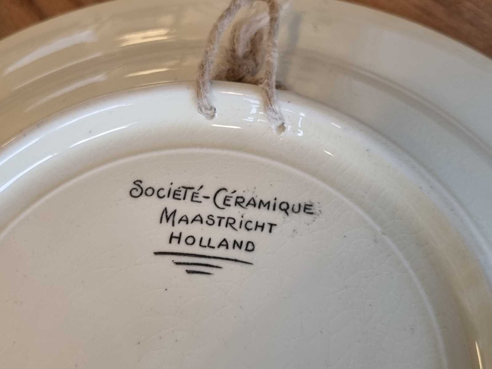 Wandbord Societe Ceramique Vincentius à Paulo 23,5 cm (grijs)