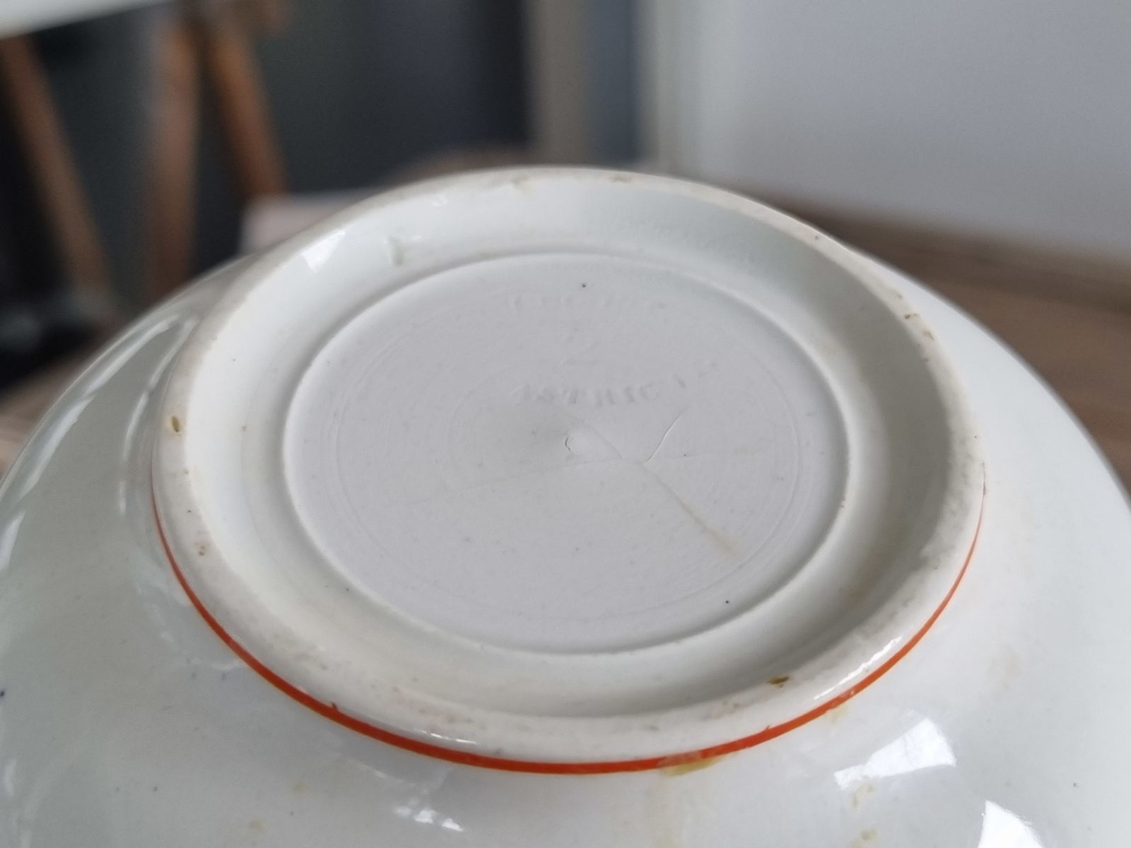 Petrus Regout Oranje met zwart Schenkkannetje