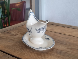 Petrus Regout Malaga blauw Sauskom op vaste onderschotel