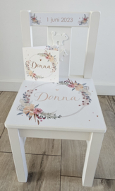 Geboortestoeltje met geboortekaartje