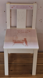 Geboortestoeltje met geboortekaartje