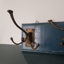 Antieke kapstokhaken, draaibaar.