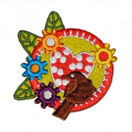 strijkapplicatie vogel in button in retro kleuren 