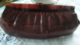 Oude slangenleren tas of clutch.