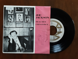 Joe Jackson met Real man 1982 Single nr S20233763