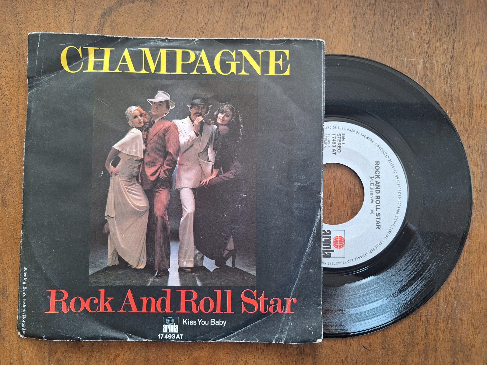 Champagne met Rock and Roll star 1976 Single nr S20233244