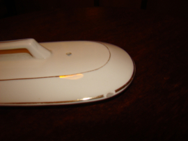 Los wit deksel met gouden biesje  voor kammenbakje.