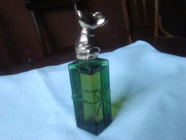 Vintage parfumflesje van Avon groen met  muisje als dop zeventiger jaren.