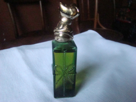 Vintage parfumflesje van Avon groen met  muisje als dop zeventiger jaren.