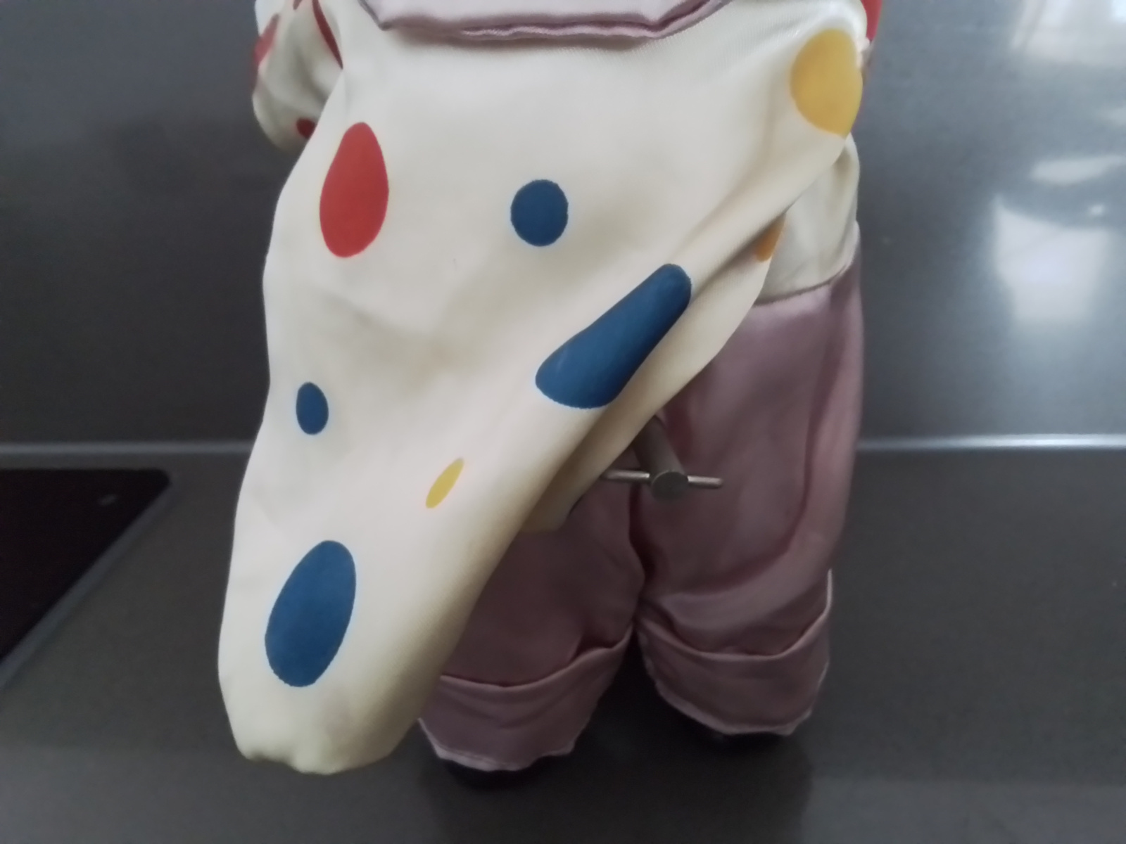 Beweegbare clown met speeldoos.