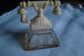 Vintage parfumflesje van Avon telefoon zeventiger jaren.